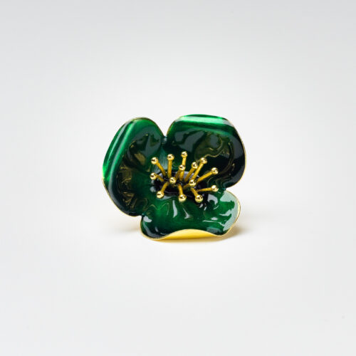 Silver ring with green enamel