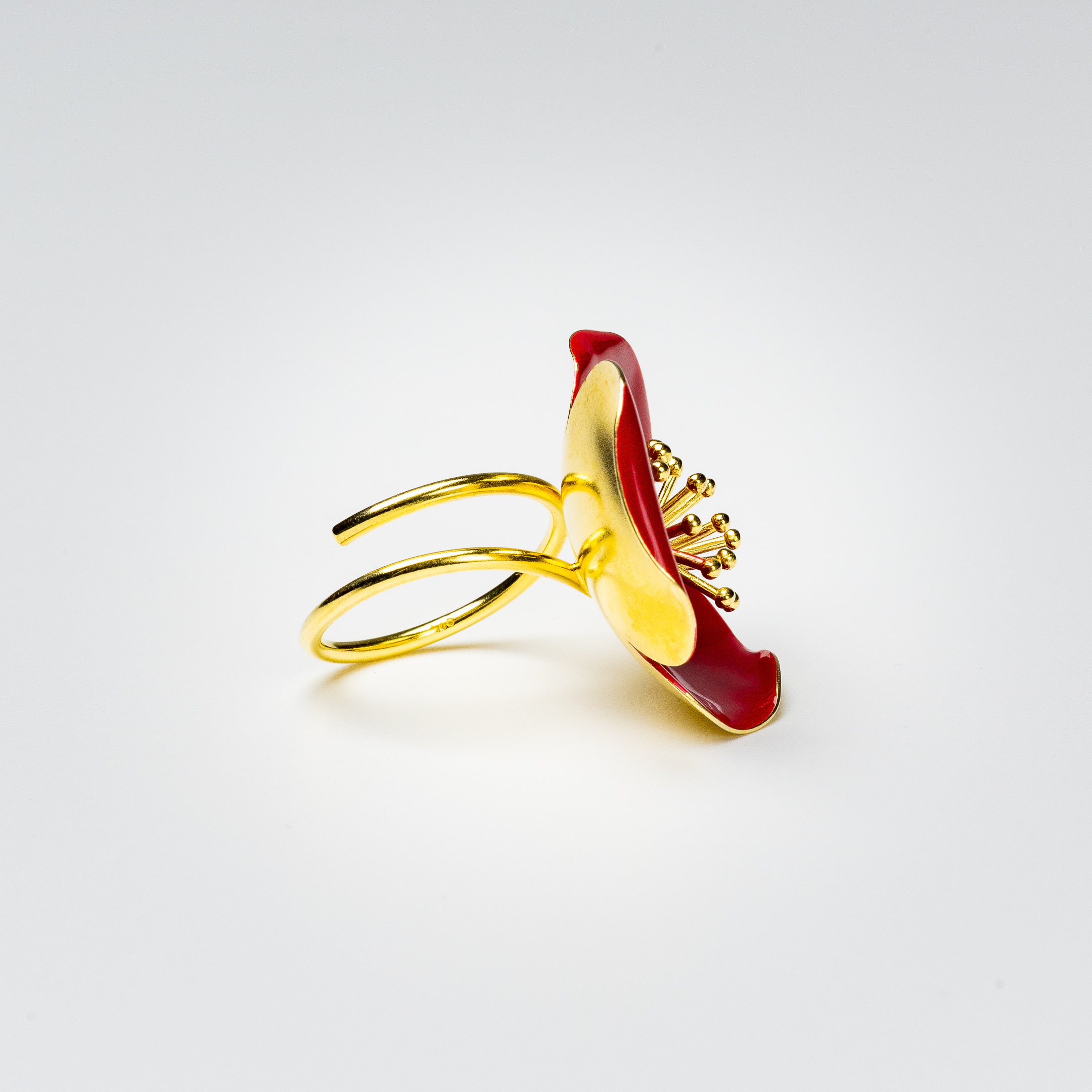 Silver ring with red enamel